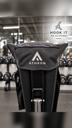 ATHRON magnetic gym towel with a hooded top, hanging on a gym rack to prevent slipping