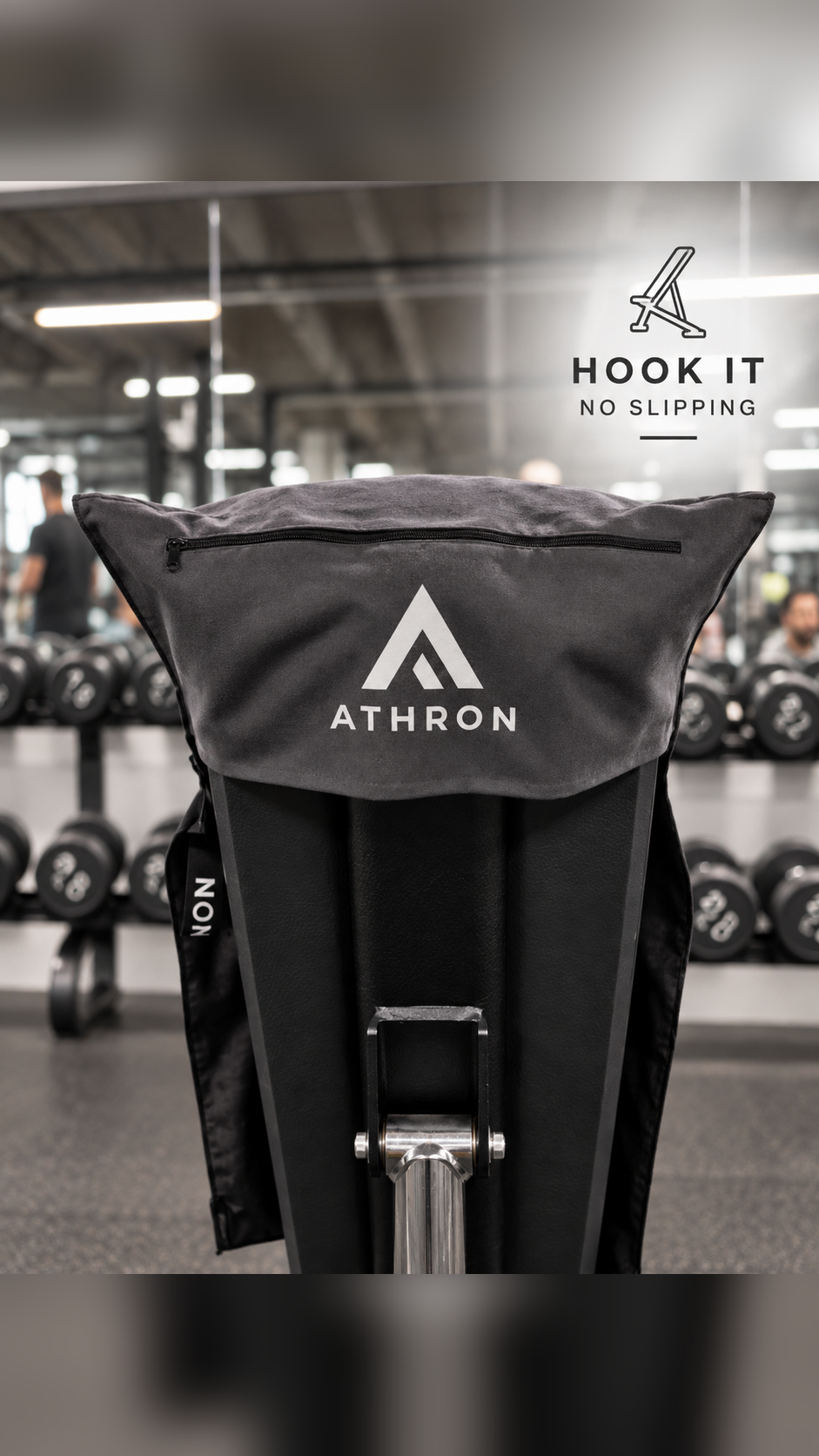 ATHRON magnetic gym towel with a hooded top, hanging on a gym rack to prevent slipping
